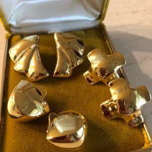 Three pair goldtone costume earrings.